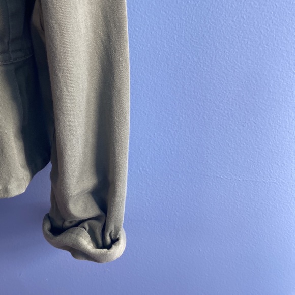 a green button down jacket - Picture 4 of 5